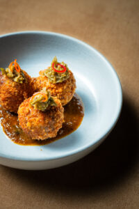 Indonesian dishes: Beef Rendang Croquettes, Green Chili Sambal